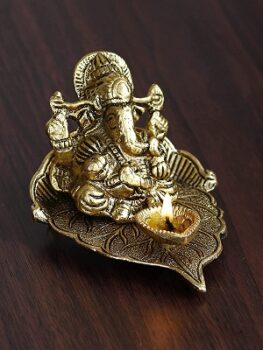 Golden Lord Ganesha with Diya