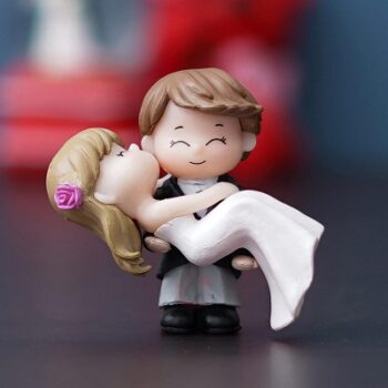 eCraftIndia Polyresin Handcrafted Bride Kissing Groom Romantic Couple Statue Decorative Showpiece